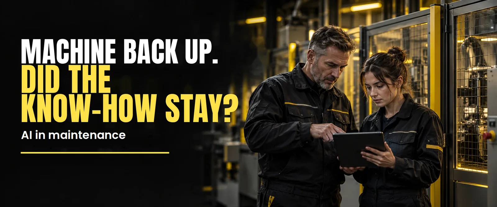 Machine back up. Did the know-how stay? Two technicians in dark overalls review information on a tablet next to a machine with yellow guarding.